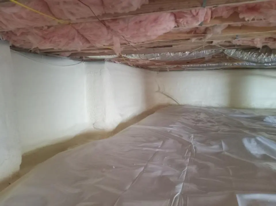Crawl space encapsulation with closed-cell spray foam for Storm Damage Roof Repair in San Dimas